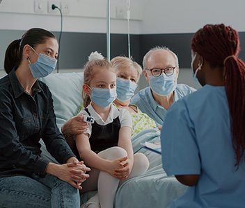 Famille au chevet d'un patient