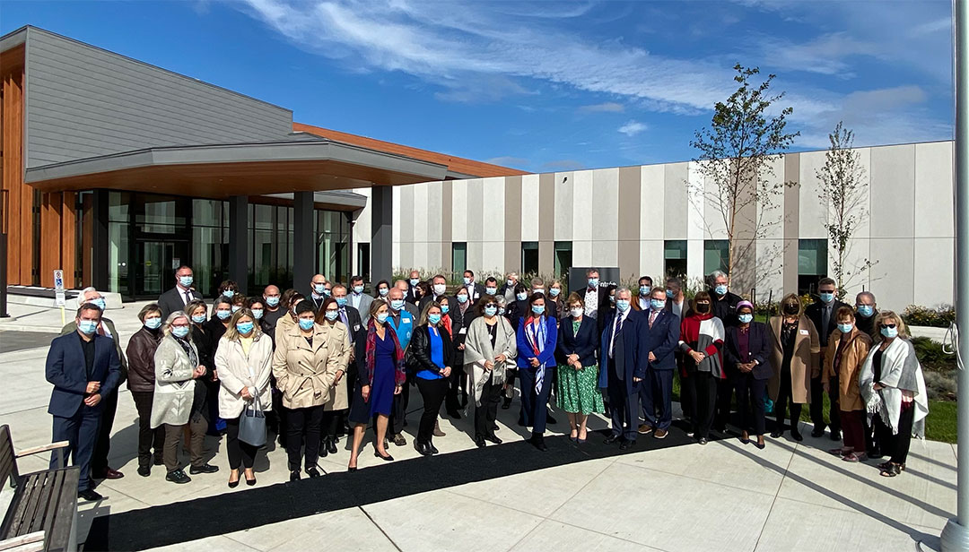 Assembly of people in front of the building